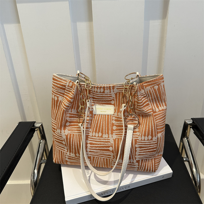 Bolso Tote simple y de gran capacidad para mujer 2024 nuevo bolso de hombro a rayas de moda coreana bolso de axila de arte relajado