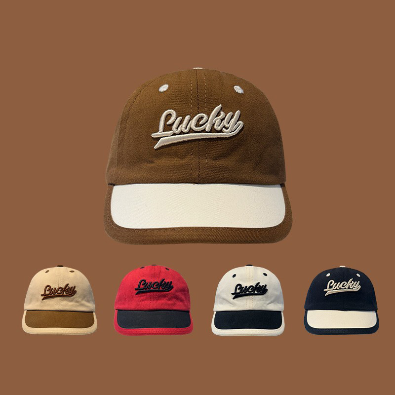 Sombrero de bebé primavera y otoño letras extranjeras sombrero de lengua de pato para niños otoño y invierno caliente sombrero de sol bebé marea de béisbol