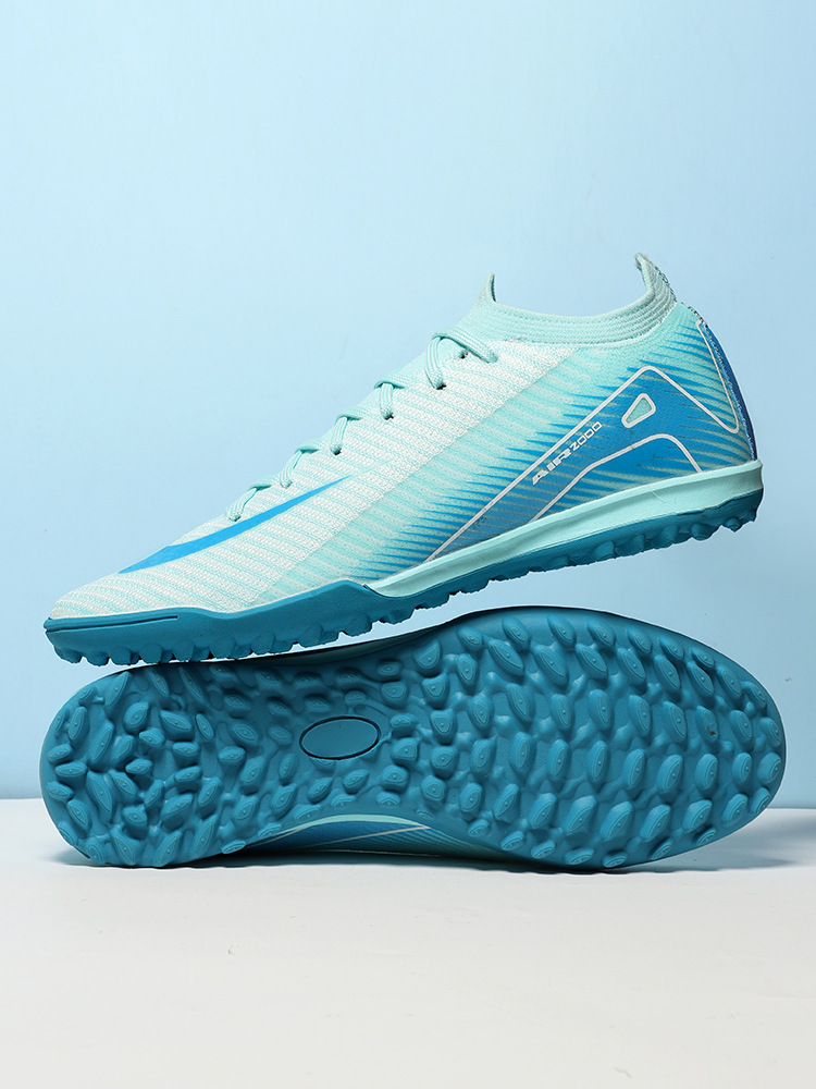 Nuevos zapatos de entrenamiento de césped interiores de hombres y mujeres transfronterizos respirables de clavos largos juveniles ventas directas