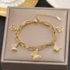 【5122】 Five butterfly bracelets are golden