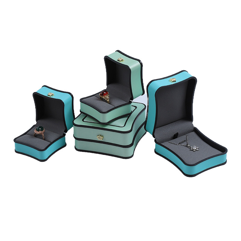 Caja de joyería corona pequeña cintura pu pendientes collar caja de anillo joyería caja de embalaje de joyería de ángulo redondeado alta sensación en stock image 3