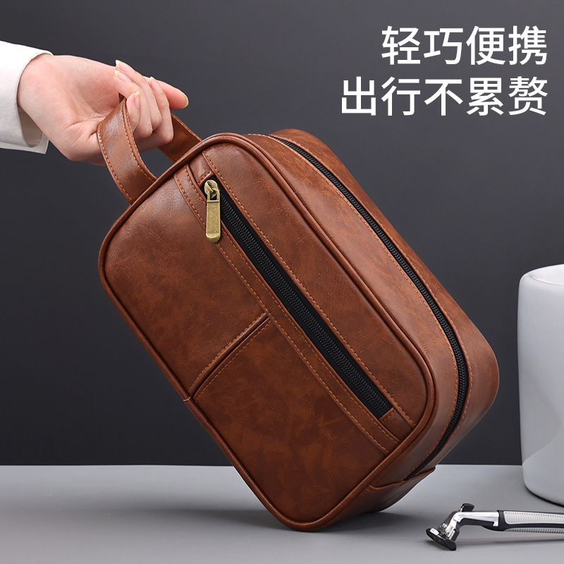 Nuevo producto transfronterizo Bolsa de lavado portátil de PU retro Bolsa de almacenamiento de productos de piel para hombres de gran capacidad Bolsa de lavado de viaje portátil