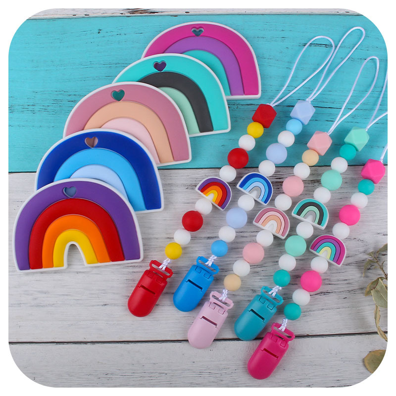 Nuevo bebé dibujos animados colorido rojo silicona teether palo pezón cadena anti-gota cadena juguete teether traje