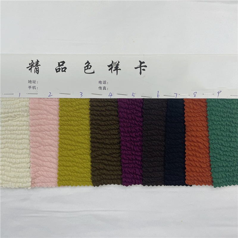 J9598 现货250g涤氨弹力夹棉空气层提花布 波浪纹提花休闲服面料