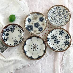 Ceramic dishes wholesale department store daily use of small commodity rattan ceramic plate disc household plate two -yuan shop stall