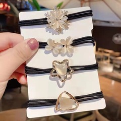 New trendy small flower black hair tie for women, Korean style elastic hairband, simple geometric cat-eye stone hair ornament, wholesale