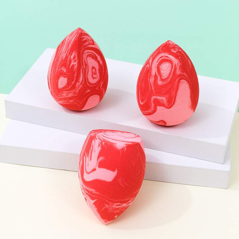 Gota de agua en forma de calabaza maquillaje de belleza de huevo soplo de polvo color mezclado sin látex maquillaje esponja colchón de aire maquillaje huevo fábrica color personalizado