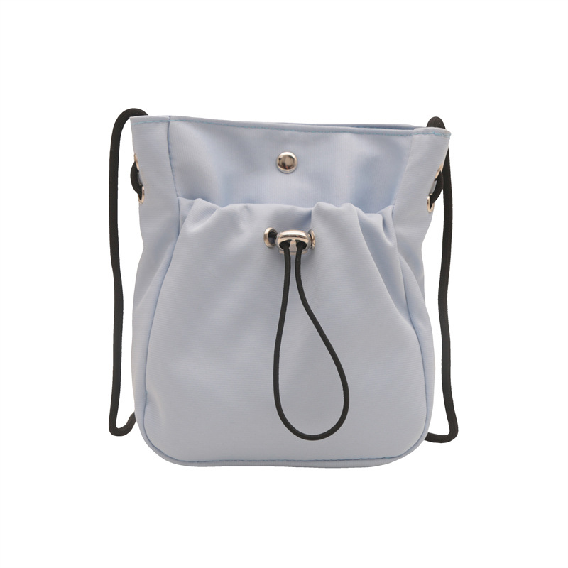 Bolsos de teléfono móvil de viento minimalistas para mujeres japonesas y coreanas bolsos de lona ligeros de cuerda de dibujo mini multifuncional bolsos de cambio de hombro