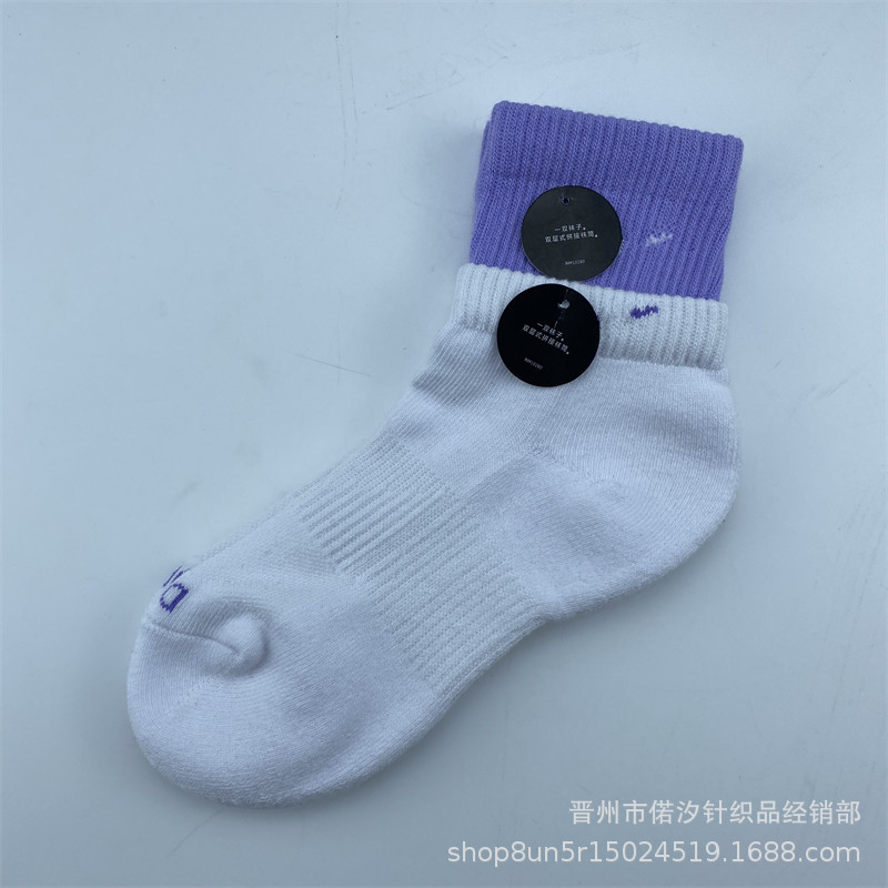 2023新品の偽の2つのつなぎ合わせのスポーツの靴下の中で筒の高い筒の男女の同項のマカロンカラーの厚いタオルの底