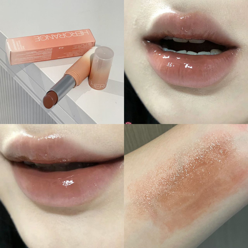 HERORANGE es un lápiz labial de agua de color con una superficie de maquillaje húmeda que no es fácil de tocar con un lápiz labial feminino tierno.