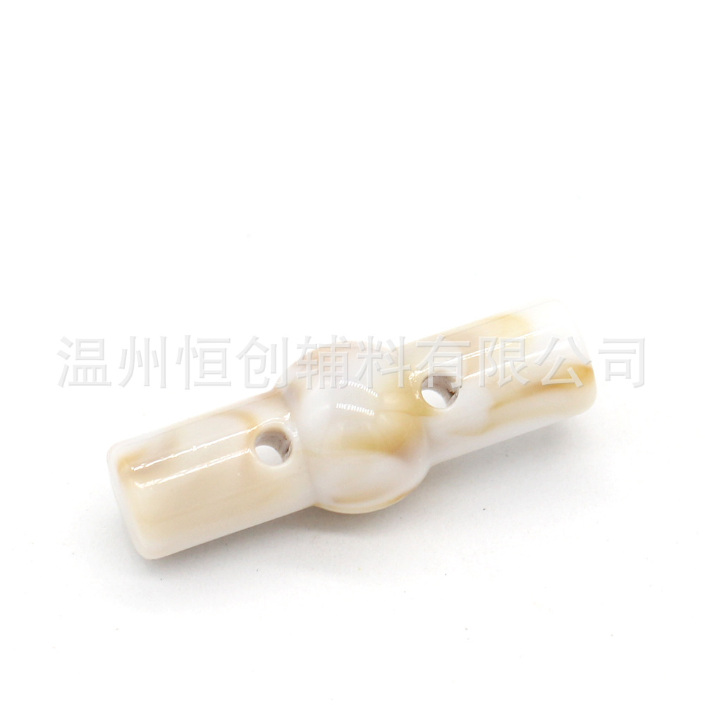 25x9mm brillante Hengchuang botón de resina cilíndrica de dos agujeros botón de estilo nacional suéter de punto botón de color de bricolaje al por mayor