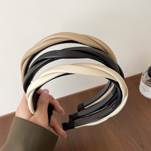 High-end leather twist headband female internet celebrity 2024 new high skull pressure hair headband hairpin retro headwear