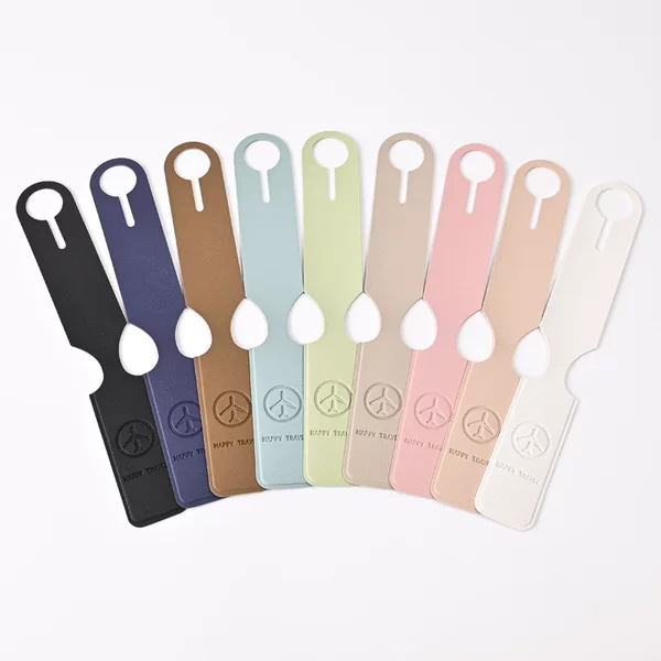 Cross-border wholesale Macaron color double-sided PVC hot-pressed leather luggage tag LOGO embossing can be set long luggage tag