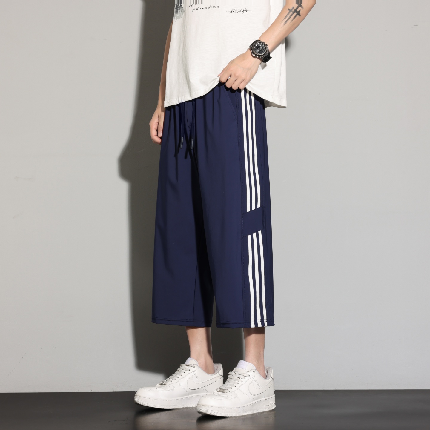 Pantalones de hielo para hombres de verano delgados deportivos de tres barras pantalones cortos gordo sueltos y pantalones casuales de hombre de tamaño grande