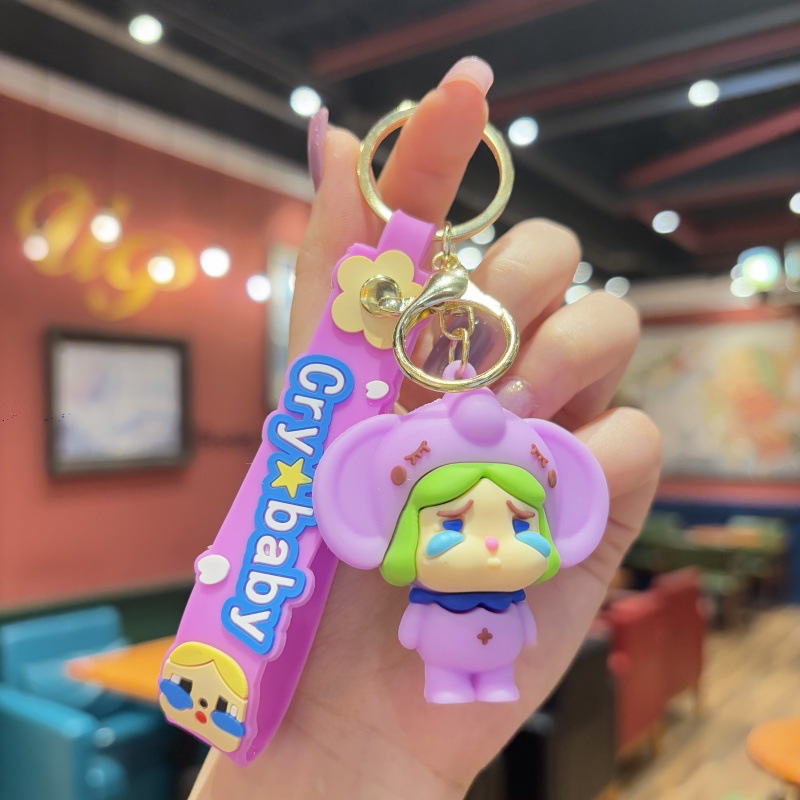 Llavero de bebé llorando de dibujos animados tridimensional linda niña mochila colgante colgante pareja llavero de coche al por mayor comercio exterior