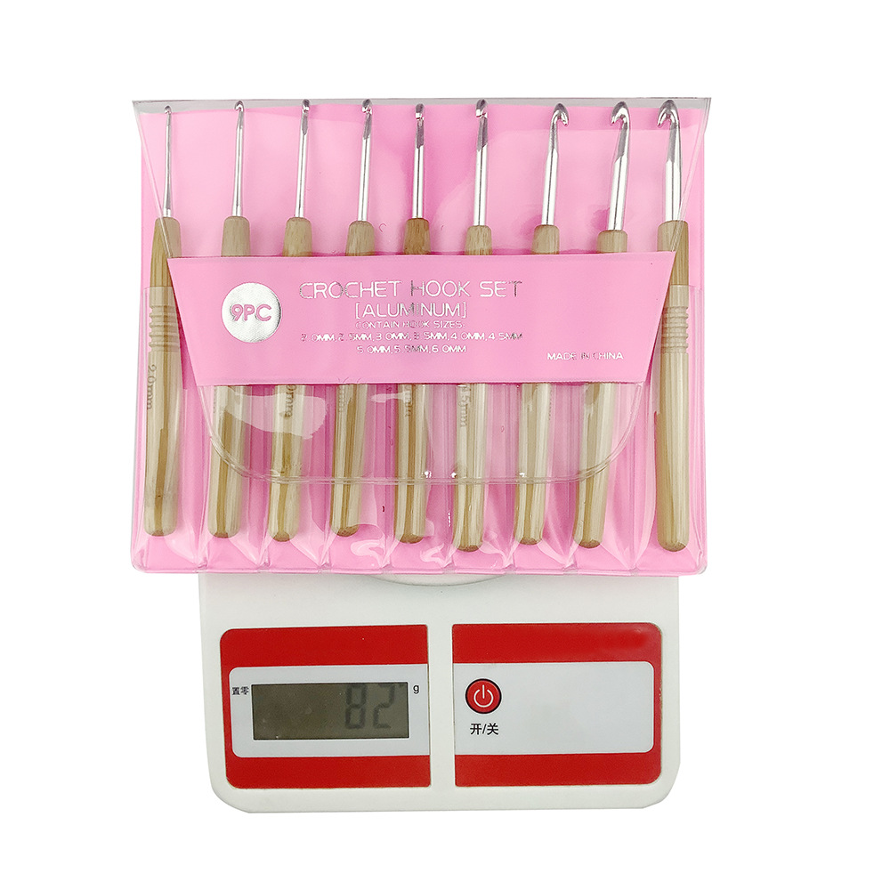 Herramienta de tejer suéter aguja nueva cilíndrica mango de bambú de aluminio crochet conjunto de 9 piezas 2. 0mm-6.0 mmvc embalaje