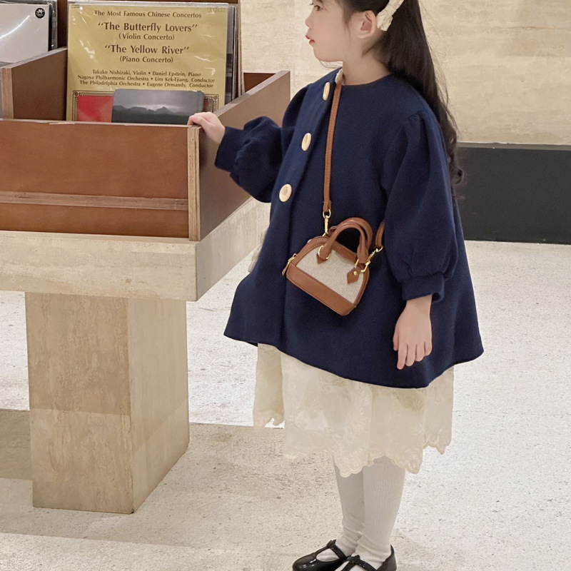 Mochila de moda de leopardo para niñas, mini bolso de concha portátil para bebés, 2025 nuevo bolso de comercio exterior para niños