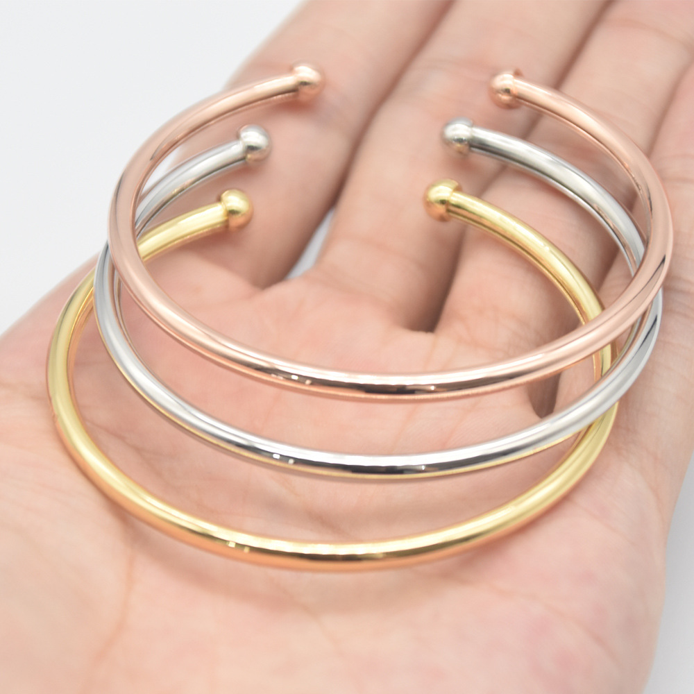 Real chapado en oro cobre abierto flexible pulsera europea y americana simple abierto Ajustable trenzado deformación pulsera para mujeres