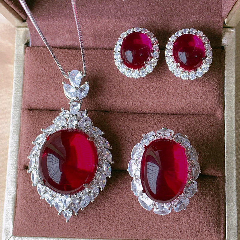 Zhuang Sheng joyería europea y americana simulación paloma sangre roja corindón superficie lisa luz traje de lujo colgante 18*20 anillo 13*18