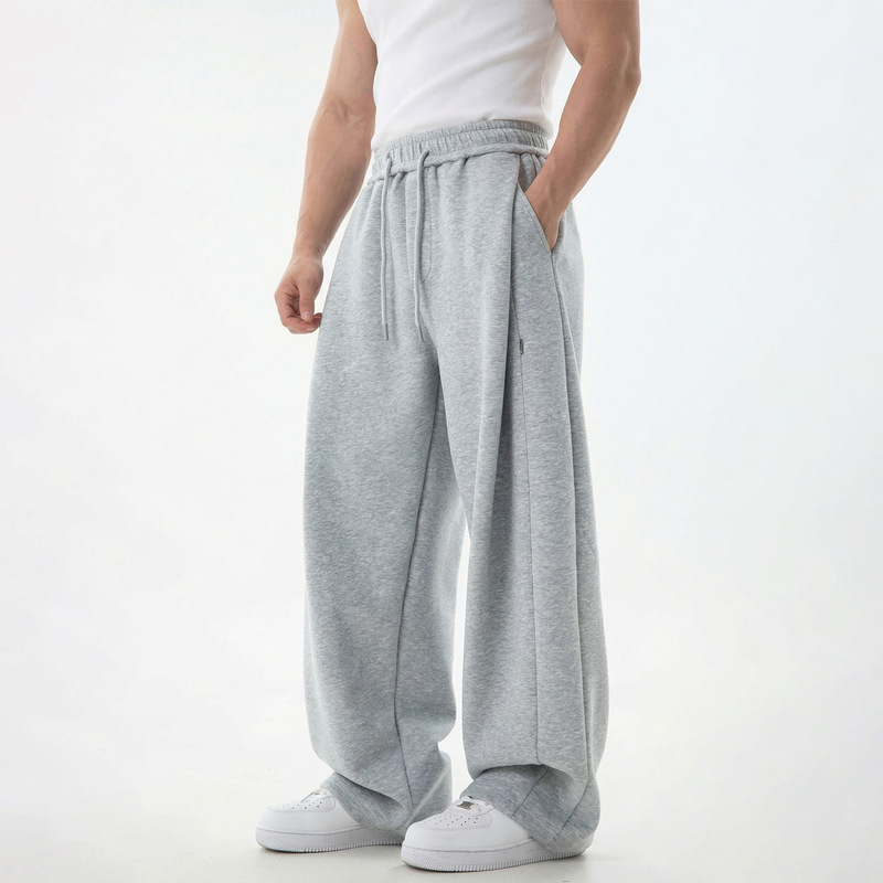 Split-Seam Sports Casual Pants, New Spring Style, Loose Fit with a Draping Effect, Slightly Tapered at the Cuffs, Trendy Brand Texture Long Pants Split-Seam Sports Casual Pants, New Spring Style, Loose Fit with a Draping Effect, Slightly Tapered at the Cuffs, Trendy Brand Texture Long Pants