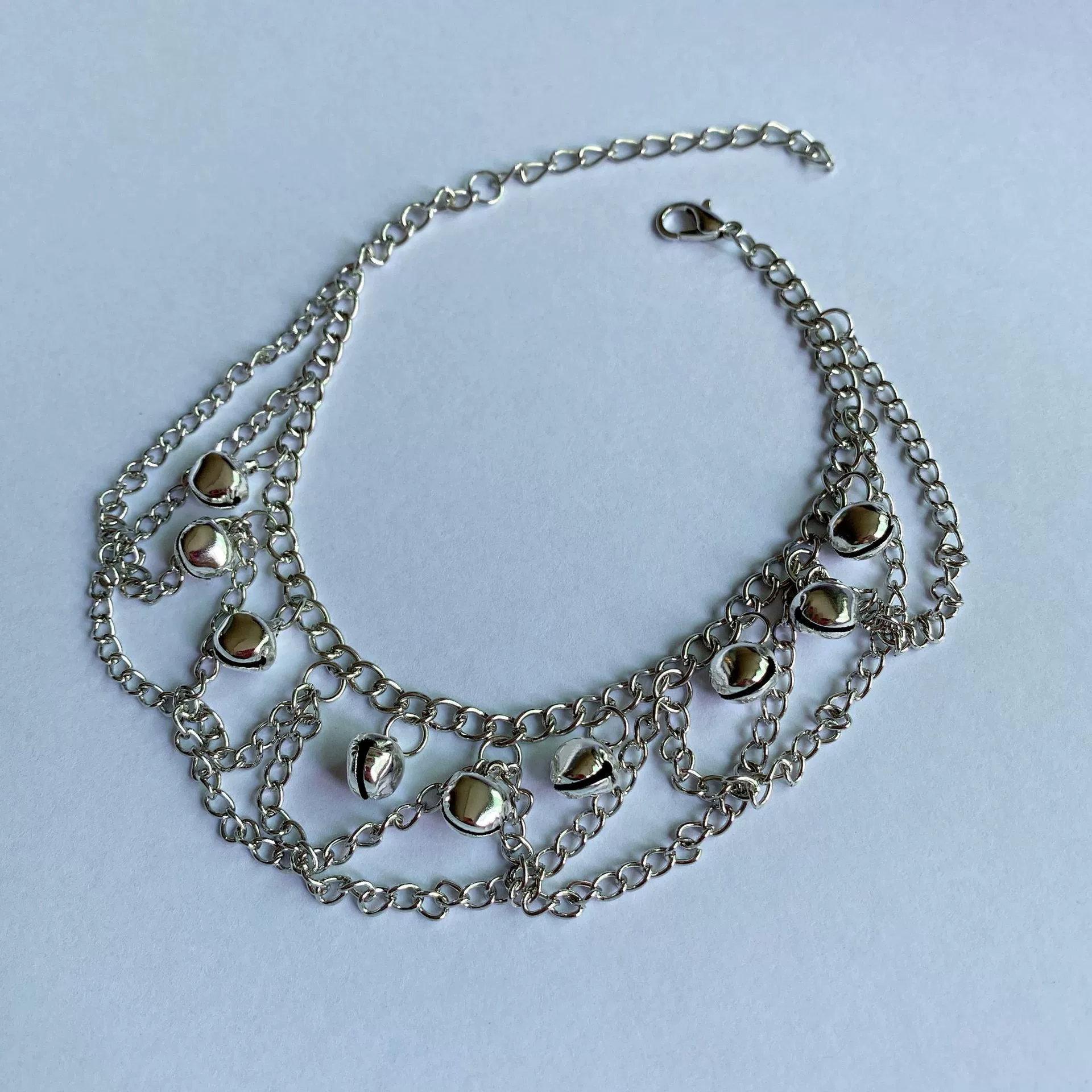 Ан ankle bracelet, fashionable wavy small bell with tassels, European style, boho style