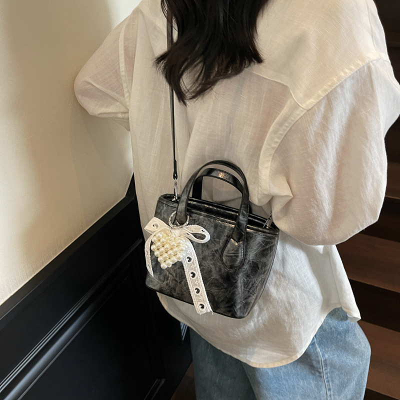 Bolso de hombro de estilo coreano, bolso de hombro de todo fósforo, nuevo estilo de verano 2025, bolso de mensajero de alta gama, bolso de hombro de estilo occidental simple