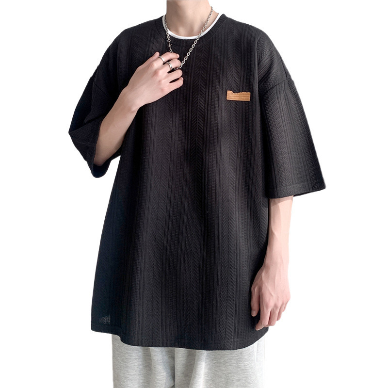 Camiseta de manga corta de verano de Hong Kong Tide para hombres inins coreanos sueltos versátiles Jacquard camiseta de cuello redondo de marca de marea chaqueta transpirable