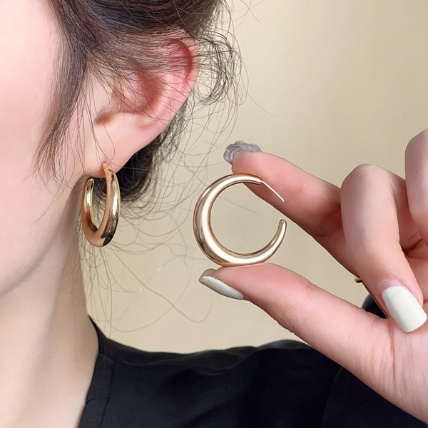 Capacious earrings hip-hop style