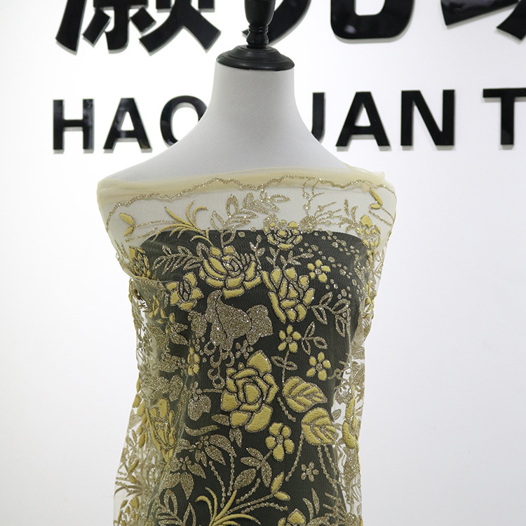 Después del proceso de tela de malla de poliéster todo hilo de malla pulverizado oro oro vestido de boda vestido de princesa relieve palacio tela de ropa Han
