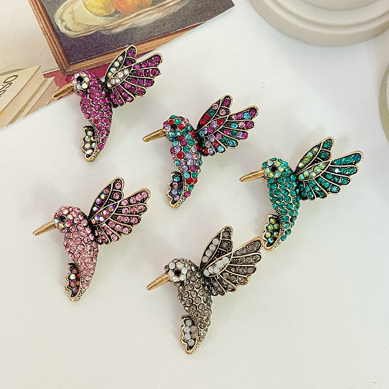 Spilla a forma di uccello con strass accessorio elegante animale_voghion.com