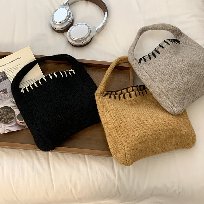 Nuevo bolso de tejido de otoño y invierno atmósfera sensación de bolsa de cesta de verduras bolso de tejido a mano bolso de lana de moda bolso de hombro