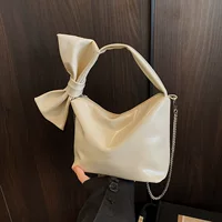 Стильная сумка через плечо с бантом и цепочкой, PU кожа, размер 21x16x10.5 см — бренд