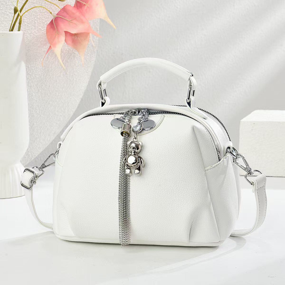 Patrón de lichi de cuero suave de moda salvaje 2025 nuevo bolso de viajero bolso de hombro de gran capacidad retro de verano