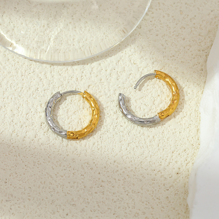 Moda transfronteriza europea y americana de acero inoxidable color aretes redondos pendientes irregulares joyas de acero de titanio joyas al por mayor