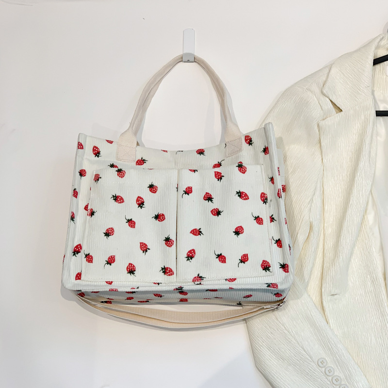 Bolsas de impresión de fresas populares de vello coreana para mujeres verano 2024 nuevo tipo transfronterizo mochila de hombro mochila