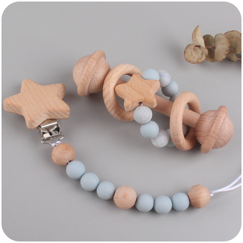 Nuevos juguetes infantiles de beech campana diente calmar bebé beech Júpiter clips cadena de tetas de silicona dos piezas conjunto