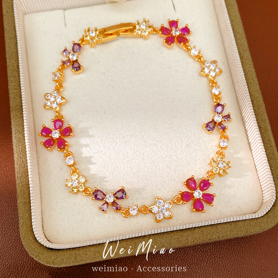 Oro verdadero, pulseras de arco de flores de piedra, pulseras de nicho lujosas, exquisitas joyas de moda al por mayor.