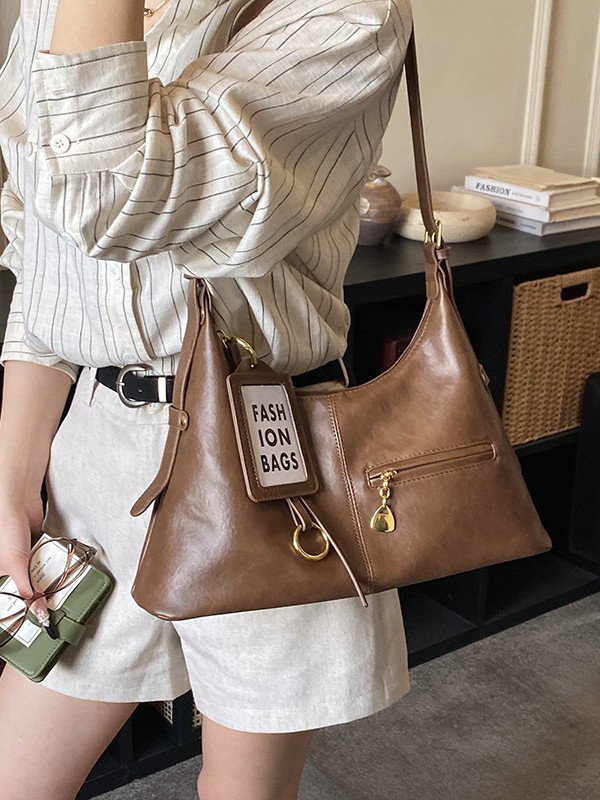 Bolsas retro de gran capacidad para mujeres 2026 nuevo estilo coreano de ocio de hombro con bolsas de brazalete inclinadas para viajar bolsas de mano simples