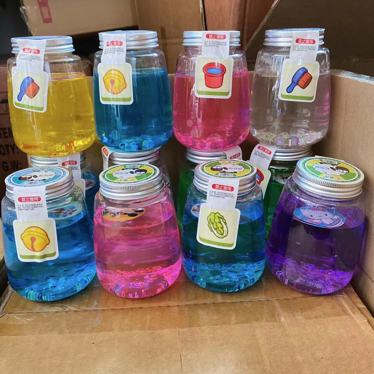 Los niños de juguete de barro de cristal puff barro de color embotellado Delgado transparente 2 yuanes grandes almacenes al por mayor descompresión bricolaje