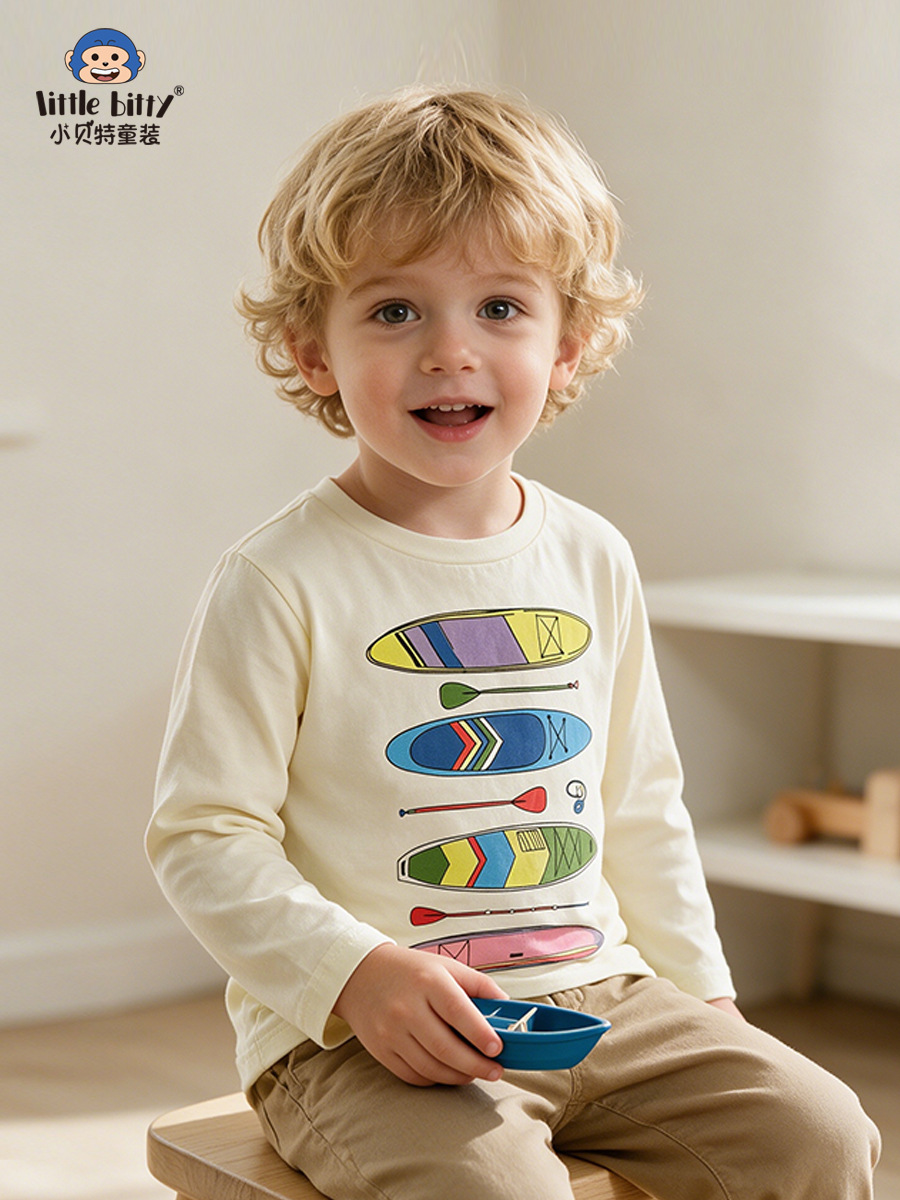 Casual and fashionable 2026 boys' long-sleeve T-shirt with cartoon kayak print, children's round-neck base shirt, in-stock clothing