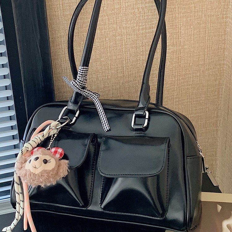 La moda coreana de nicho de estilo extranjero bolsas de palos debajo de las axilas para mujeres 2026 primavera nueva bolsa diaria de Boston bolsas de bolos