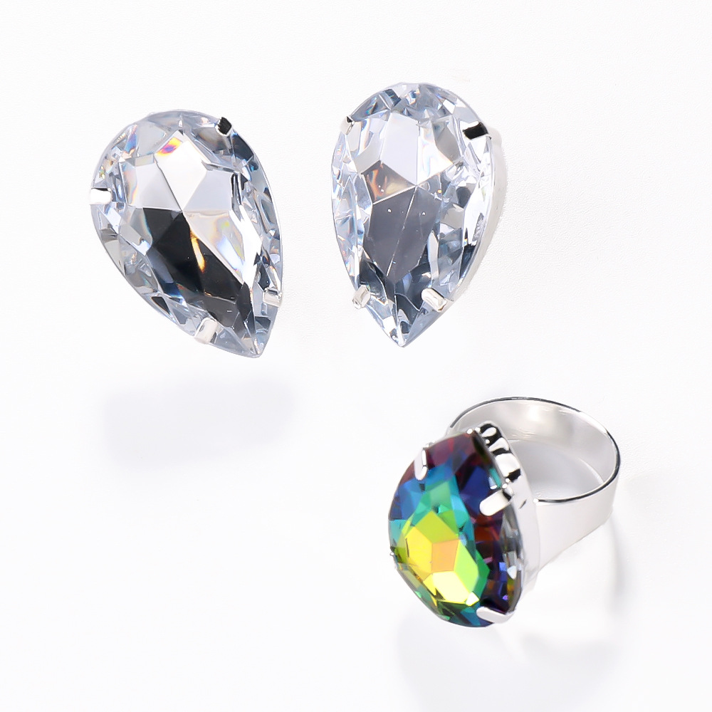 Temperamento europeo y americano gota de agua conjunto de joyería simple pendientes de diamante accesorios de anillo ajustable conjunto de joyería