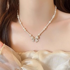 ボウペンダントパールネックレス女性のための 2025 新しいライト高級ニッチハイエンド鎖骨チェーン夏多用途ネックレス