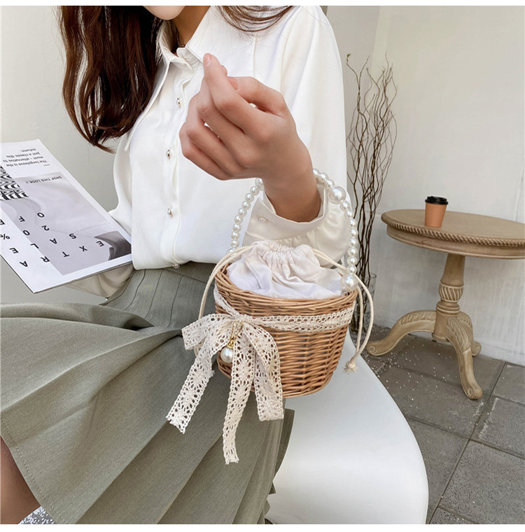 Fashion Round Straw Pearl Portable Bag display picture 47