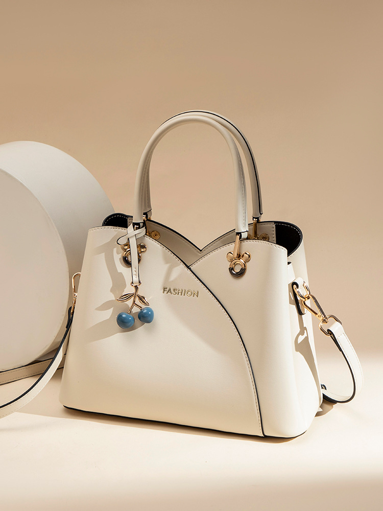 Bolso de cuero para mujeres, bolso de viaje de cuatro estaciones, bolso de moda de madres de mediana edad, bolso de alta calidad, bolso de mujer.