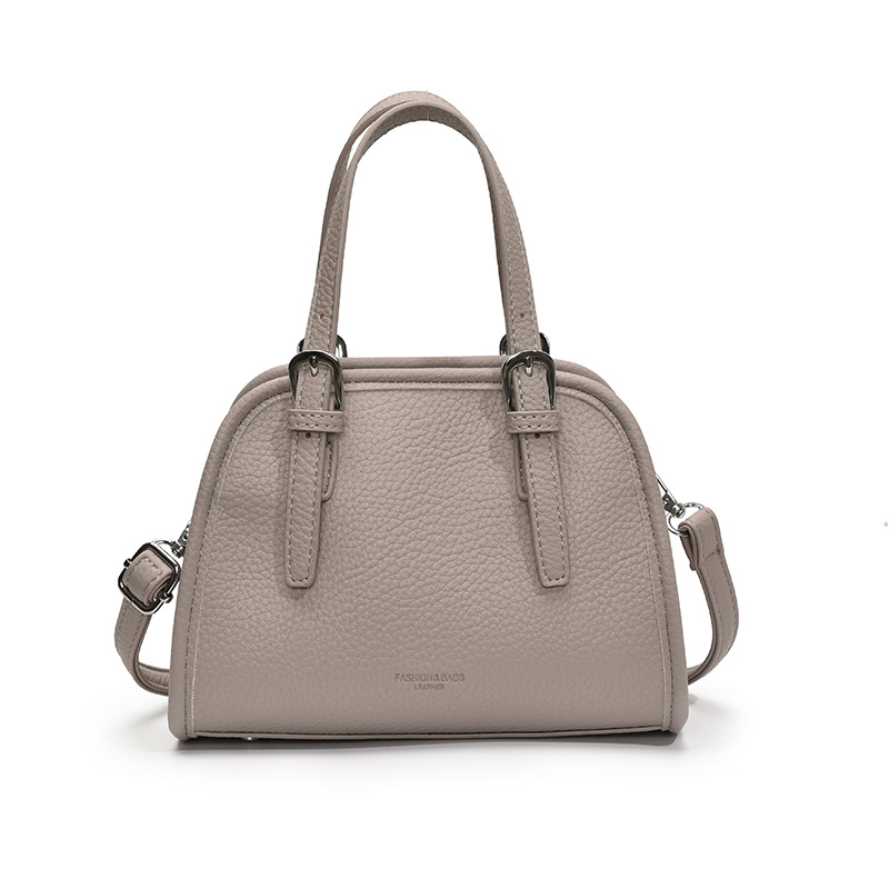 Bolsos populares de este año 2025 primavera y verano nuevo bolso femenino casual con patrón de lichi bolso de hombro simple bolso de mensajero de viaje