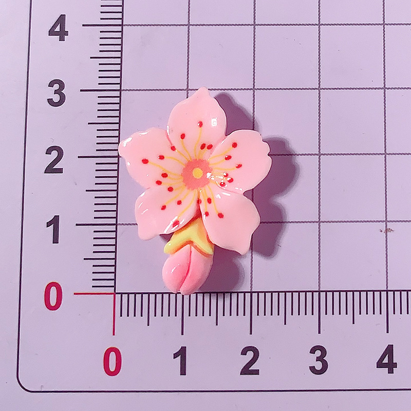 Nuevos accesorios de resina de bricolaje de flor de durazno rosa de dibujos animados, pegamento de crema, carcasa para teléfono móvil, accesorios para el cabello, zapatos, colgantes de hebilla, materiales hechos a mano