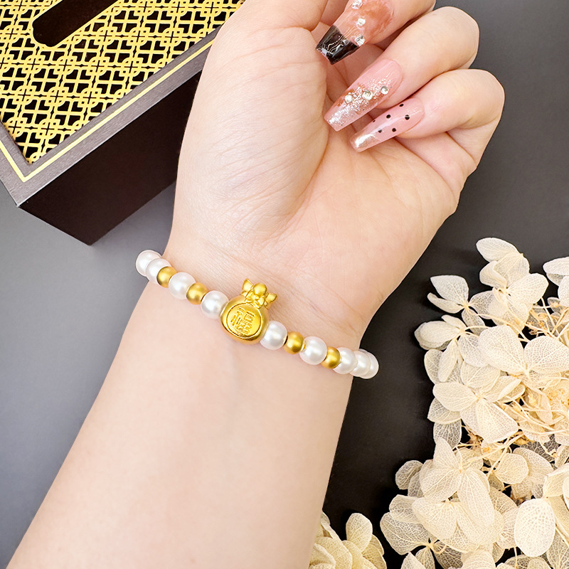 Nuevos productos Shajin Fu bolsas Fuzi pulseras de perlas mujeres versátiles alta sensación de lujo ligero temperamento joyas de aleación de cobre al por mayor