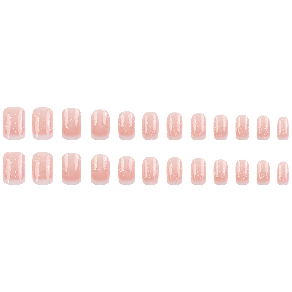 El método de uso de uñas europeas de brillo fino comercio exterior 24 piezas de uñas blanqueadoras suaves en un lote de uñas falsas de viaje