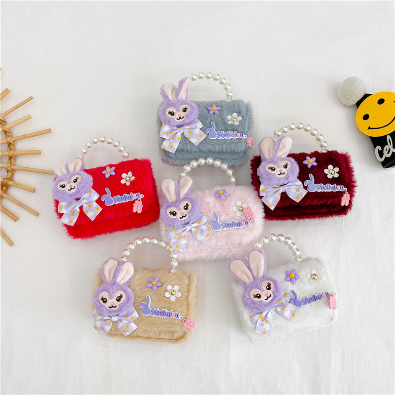 Chanel estilo princesa flor accesorios bolsa conejito bolso de hombro del niño Bolsa de felicitación de Año Nuevo estilo coreano bolsa de mensajero de los niños de dibujos animados